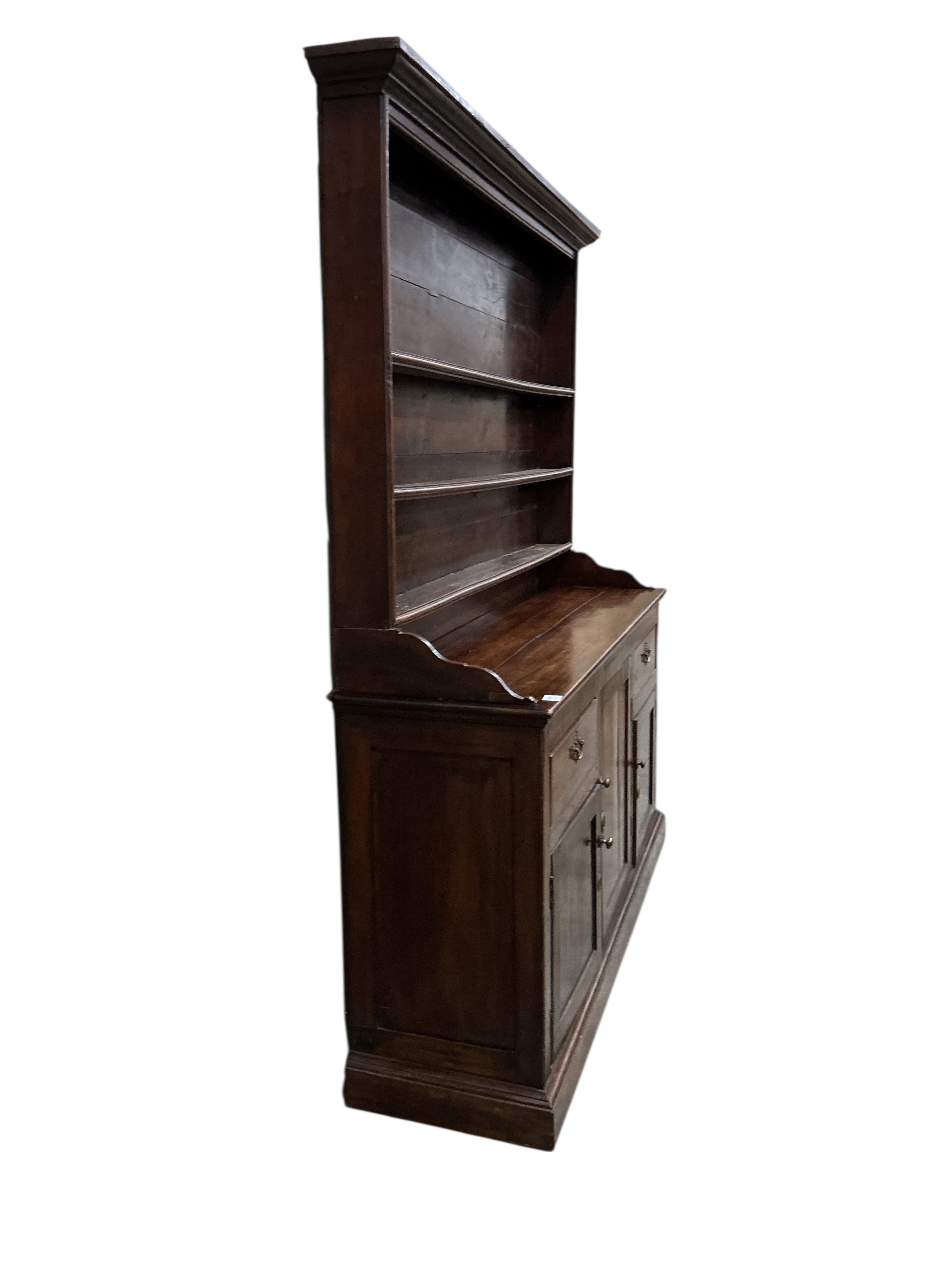 An early 19th century pine and cherry dresser with boarded rack, width 165cm, depth 43cm, height 189cm